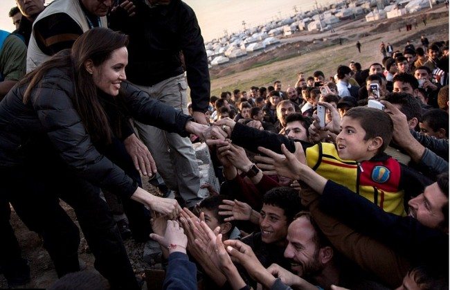 Angelina Jolie 250C3D1300000578 2925706 Reaching out Special Envoy Angelina Jolie meets members of the Y m 8 1422244326655 1 20 Reasons Why Angelina Jolie Is Not Just the 'Most Beautiful' but the Most Inspirational Hollywood Actress of All Times Tomatoheart 1