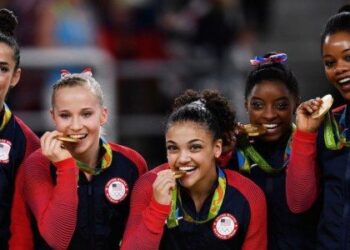 This is Why the Olympic Medal Winners Bite their Medals Tomatoheart.com