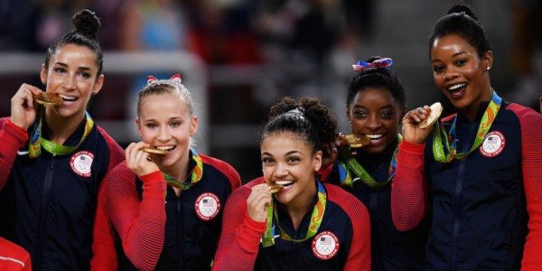 This is Why the Olympic Medal Winners Bite their Medals Tomatoheart.com